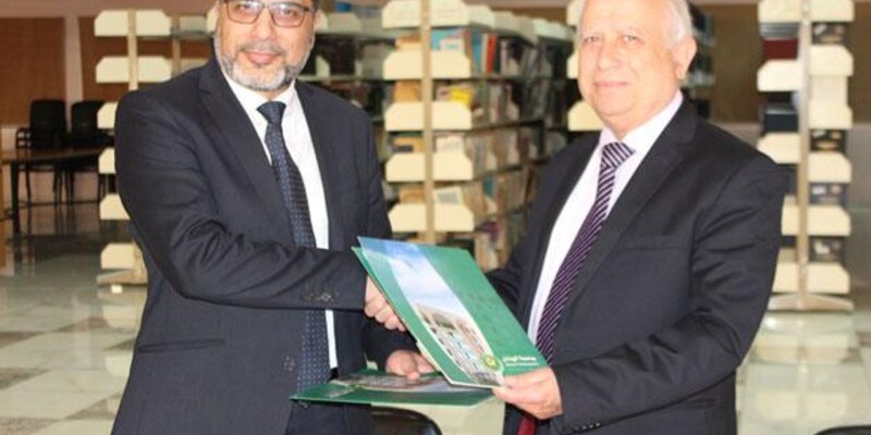 بروتوكول تعاون بين الجامعة وإذاعة الفجر